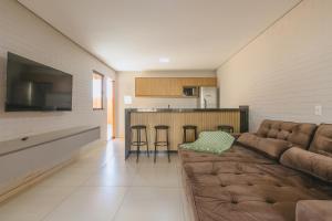 Posezení v ubytování Refúgio com piscina privada - Caldas Novas