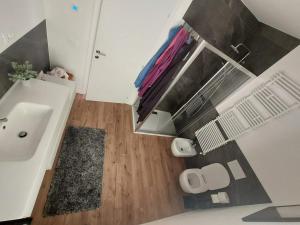 an overhead view of a bathroom with a sink at Gemma del Lagorai in Torcegno +7 photos