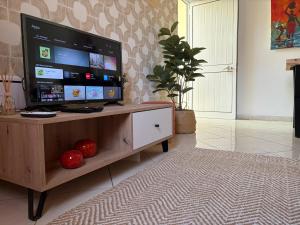TV a/nebo společenská místnost v ubytování Isabel s Bay