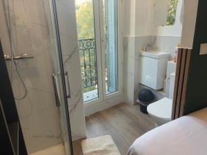 Katil atau katil-katil dalam bilik di Hotel du Pharo