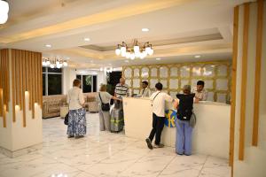 Huéspedes de Hotel Mustang Holiday Inn