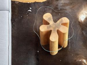 a wooden heart shaped object with a wire on a table at Apartment Chesa Vadret 12 by Interhome in Pontresina