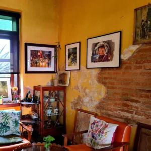 Un lugar para sentarse en Sittisang Heritage House 1920