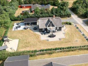 an aerial view of a house with a large yard at Holiday Home Benita - 400m to the fjord by Interhome in Skjern