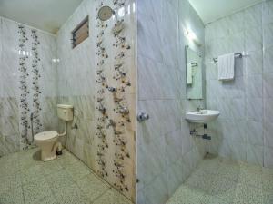 Koupelna v ubytování Hotel Flamingo