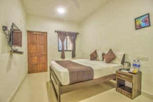 Postel nebo postele na pokoji v ubytování Hotel Flamingo