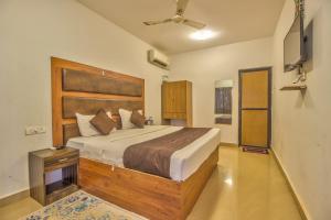 Postel nebo postele na pokoji v ubytování Hotel Flamingo