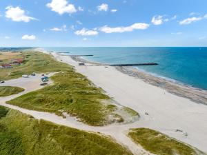 an aerial view of a beach with the ocean at Holiday Home Answald - 250m from the sea by Interhome in Harboør