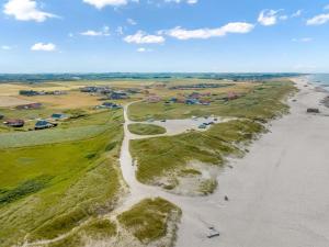 an aerial view of a beach and a road at Holiday Home Answald - 250m from the sea by Interhome in Harboør