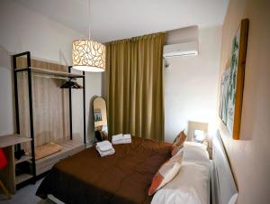 a bedroom with a large bed in a room at Incoming Quartieri Spagnoli in Naples