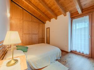 Postel nebo postele na pokoji v ubytování Holiday Home Picchio Primavera by Interhome