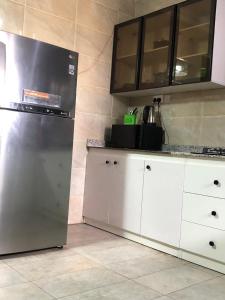 Η κουζίνα ή μικρή κουζίνα στο Baels Suites