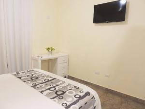 Μια τηλεόραση ή/και κέντρο ψυχαγωγίας στο Majestic View Apartment II