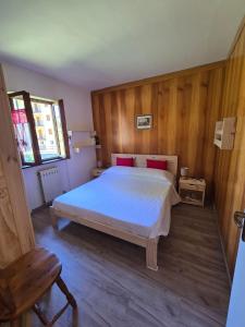 Postel nebo postele na pokoji v ubytování Casa Malva - Residenze Bucaneve