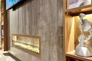 a mirror sitting on a shelf next to a fireplace at State of Peace in Marina - By AppartAli in Casablanca-Port