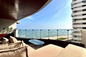 a living room with a view of the ocean at State of Peace in Marina - By AppartAli in Casablanca-Port