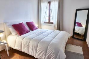 Postel nebo postele na pokoji v ubytování Yoga and sound 1