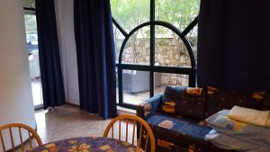 Postel nebo postele na pokoji v ubytování Apartments Vile Holiday