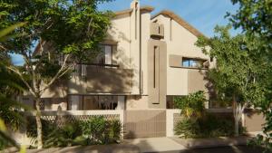 een wit gebouw met bomen ervoor bij Balinese Style Pool Villa in Goa by Amorey Stays in Anjuna