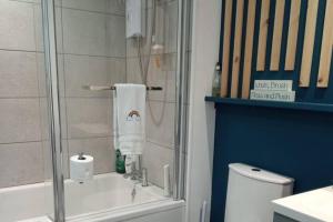 a bathroom with a shower and a sink and a toilet at 2 Bed Cottage Sleeps 4 -Private Garden -Pets Okay in Blairgowrie +13 photos
