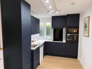 Kuchyň nebo kuchyňský kout v ubytování Cottage Sleeps 10 with Pets Allowed