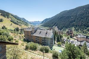 an aerial view of a building in the mountains at Casa Blanhiblar by Totiaran in Naut Aran