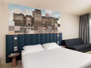 Katil atau katil-katil dalam bilik di Mercure Hotel Rimini Artis