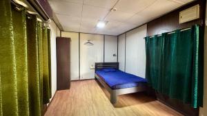 Postel nebo postele na pokoji v ubytování River Edge Resort & Café