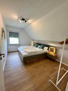 Postel nebo postele na pokoji v ubytování Möhnesee und Soest - in der Natur See&Soest