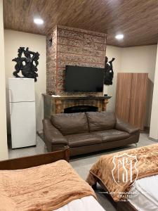 TV a/nebo společenská místnost v ubytování Saint Michel Chalets