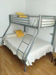 a bedroom with two bunk beds in a room at House Atarfe LINING1 in Atarfe
