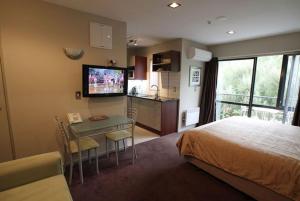 TV a/nebo společenská místnost v ubytování Athena Motel