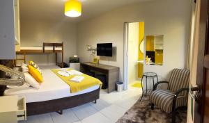 Ένα ή περισσότερα κρεβάτια σε δωμάτιο στο Pousada Anjos - à 2 quadras do mar +63 φωτογραφίες