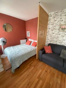 Postel nebo postele na pokoji v ubytování Y&E - Gare SNCF - Cité Congrès - Centre - Parking