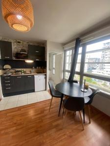 Kuchyň nebo kuchyňský kout v ubytování Y&E - Gare SNCF - Cité Congrès - Centre - Parking