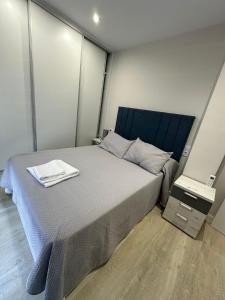 Ένα ή περισσότερα κρεβάτια σε δωμάτιο στο Piso Bedoya