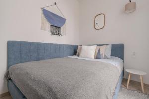 Postel nebo postele na pokoji v ubytování Harbor Apartments - Sosnowiec