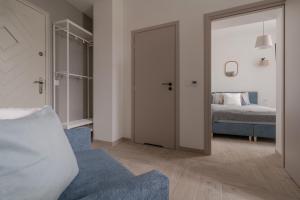 Postel nebo postele na pokoji v ubytování Harbor Apartments - Sosnowiec