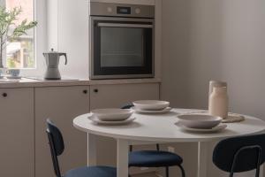 Kuchyň nebo kuchyňský kout v ubytování Harbor Apartments - Sosnowiec