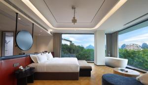 a bedroom with a large bed and a large window at Lucky house in Gaotian +36 photos