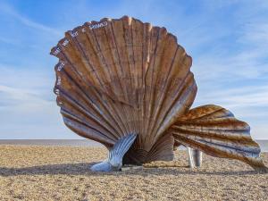 a shell sculpture sitting on the beach at The Nest in Aldringham