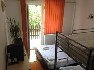 Postel nebo postele na pokoji v ubytování Hotel Romantik