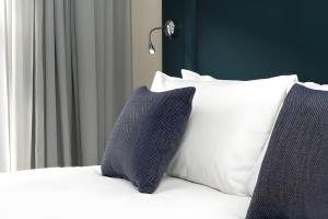 Postel nebo postele na pokoji v ubytování The Chapter Hotels - London Hyde Park