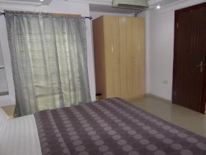 Katil atau katil-katil dalam bilik di TheoDawn Hotels @ Suite 29
