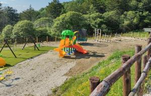 a park with a playground with a slide at Country House Chiciabocca in Apecchio +7 photos