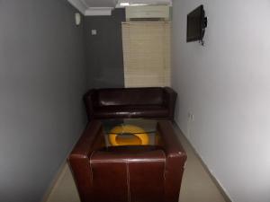Ruang duduk di TheoDawn Hotels @ Suite 29