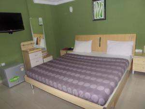 Katil atau katil-katil dalam bilik di TheoDawn Hotels @ Suite 29