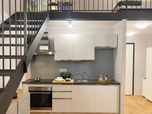 Η κουζίνα ή μικρή κουζίνα στο Loft Pellicceria +22 φωτογραφίες