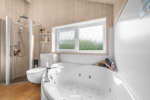 Ένα μπάνιο στο Ferienhaus Möwenstübchen Grömitz +21 φωτογραφίες