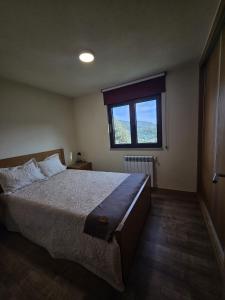 Ένα ή περισσότερα κρεβάτια σε δωμάτιο στο Casa dos Pobres